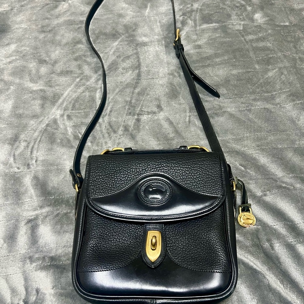 Dooney & Bourke AWL crossbody carrier bag